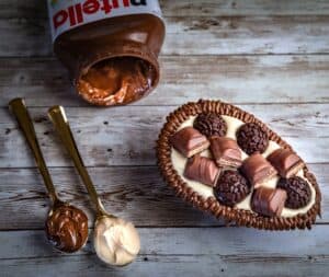 Cake with Chocolate Bars and Cream