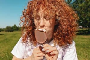 A Woman Eating Chocolate